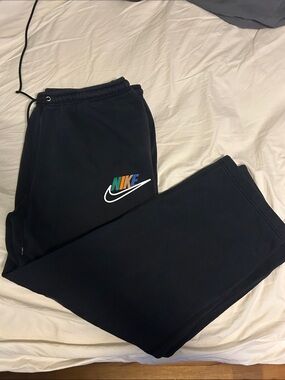 Nike Black Joggers with Multicolor Logo and White Swoosh